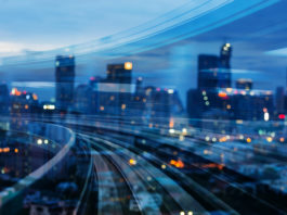 The Future of Family Offices: The Evolution of Responsible Wealth Ownership doubleexposuretraintrackwithblurredlightcityofficebuilding