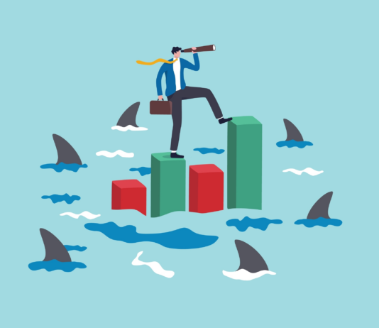 Illustration of a businessperson surrounded by sharks