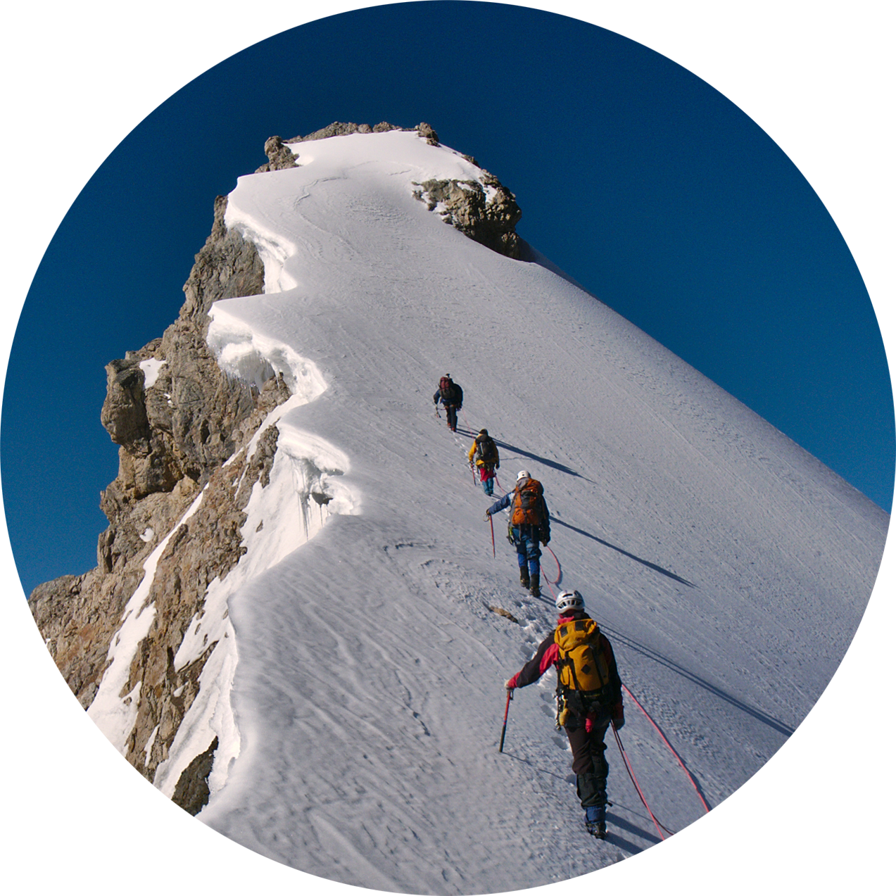 Snowy mountain with climbers; image couresty of Shutterstock