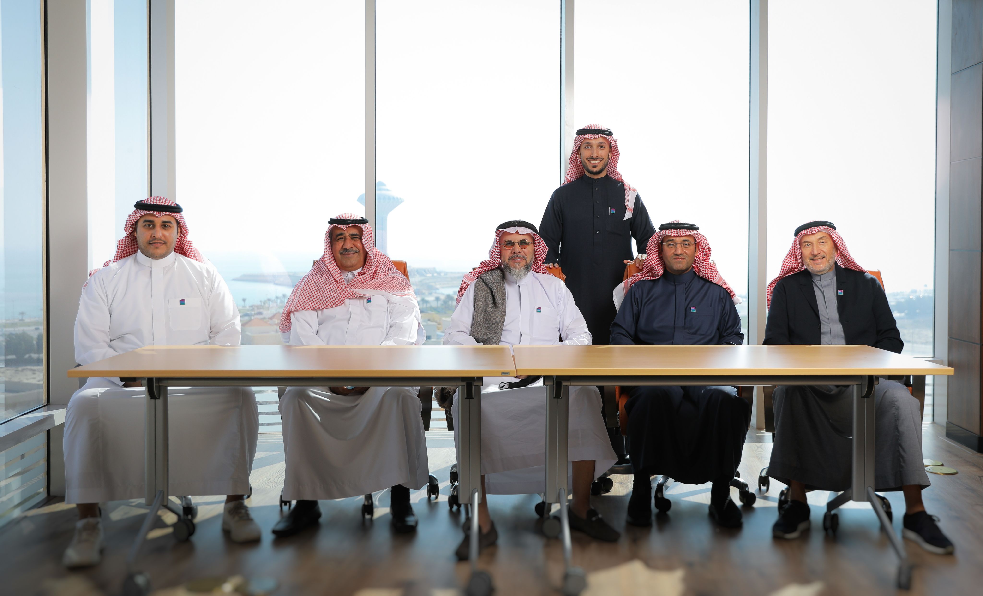Abdulrahman with Tilal's board of directors; image courtesy of AWN